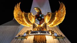 A statue of the Garuda Pancasila, the national emblem of Indonesia, is seen at the monument after a night vigil marking the National Heroes Day at Kalibata Heroes' Cemetery in Jakarta on November 10, 2025. The Kalibata Heroes' Cemetery, inaugurated in 1954, is Indonesia's main national cemetery, where more than 10,000 military personnel, veterans, and recipients of the nation's highest honors are buried. (Photo by YASUYOSHI CHIBA / AFP) (Photo by YASUYOSHI CHIBA/AFP via Getty Images)
